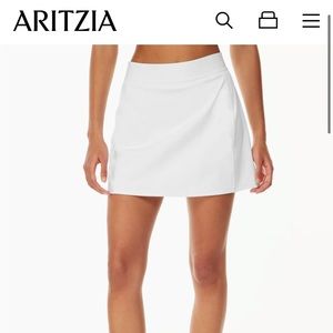 aritzia tnaction court mini skirt